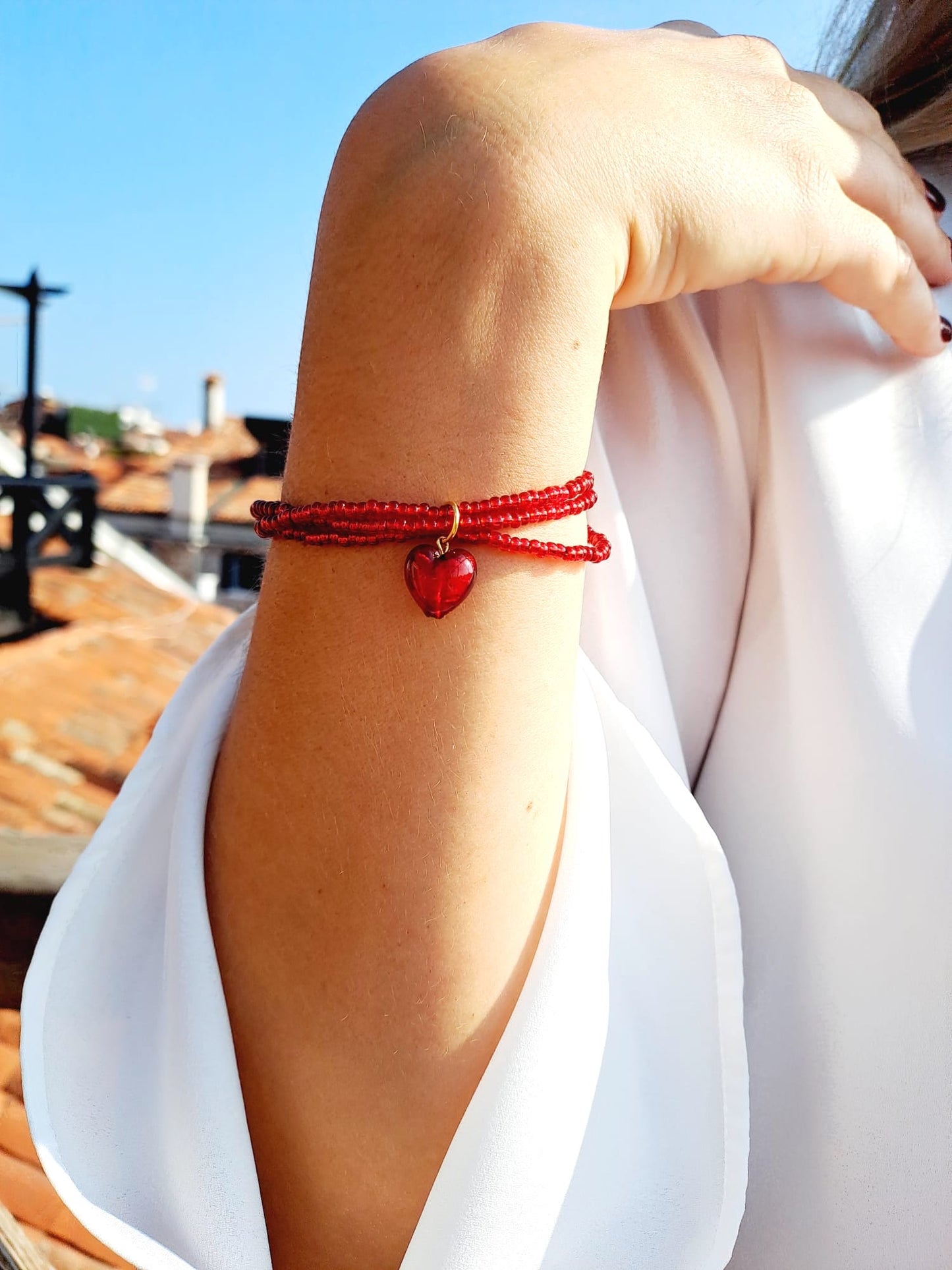 Red parure with multistrand bracelet and earrings in Italian Murano glass